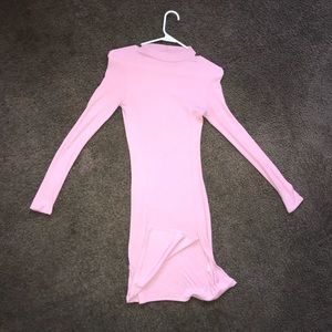 Turtle neck tight fit dress with a slit
